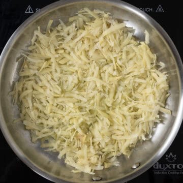 Frying hashbrowns. 