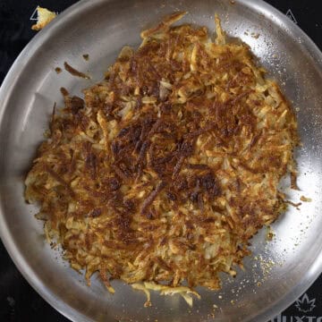 Frying hashbrowns.