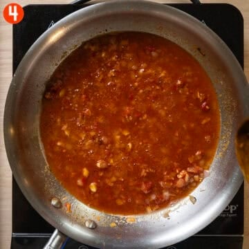 Deglazing pan with vodka.
