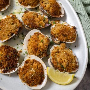 Baked clams on a plate.