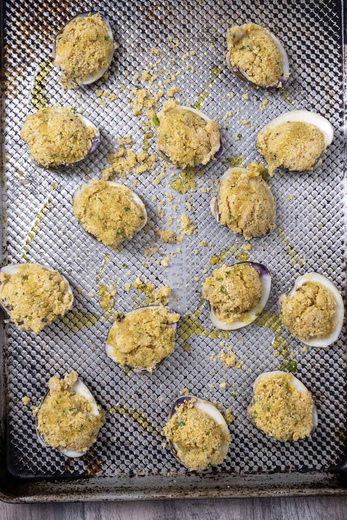 Stuffed clams on a baking tray.