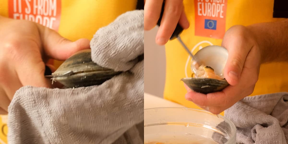 Vinny shucking clams with a knife.