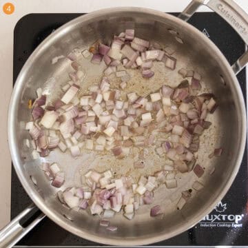 Sauteing shallots in the saucepan.