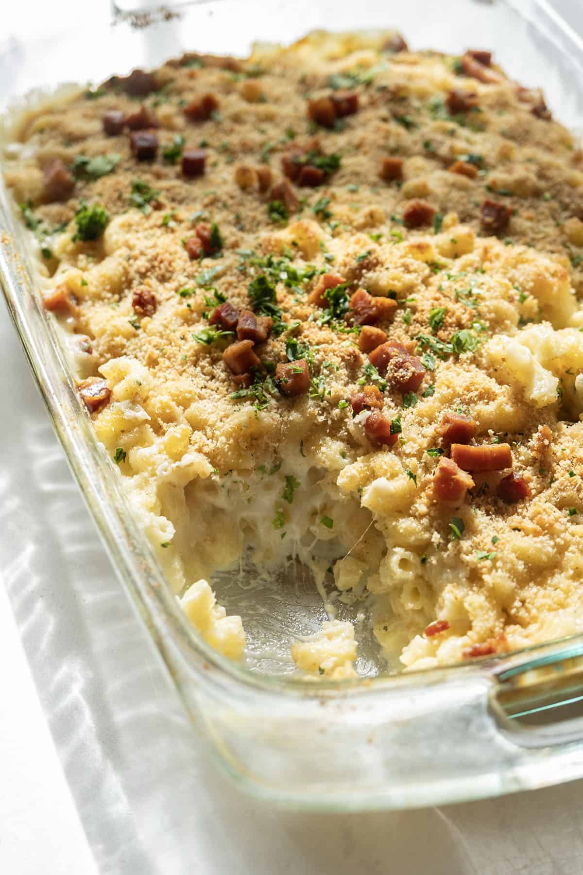 Close up of cross section of baked mac and cheese.