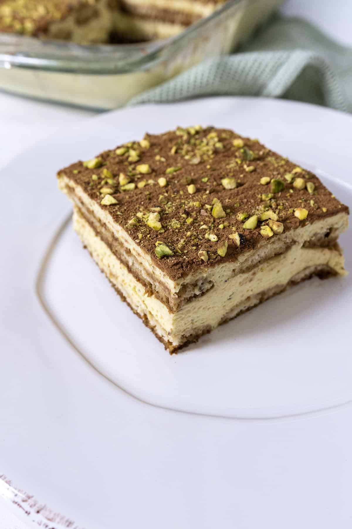 Pistachio tiramisu on a plate.