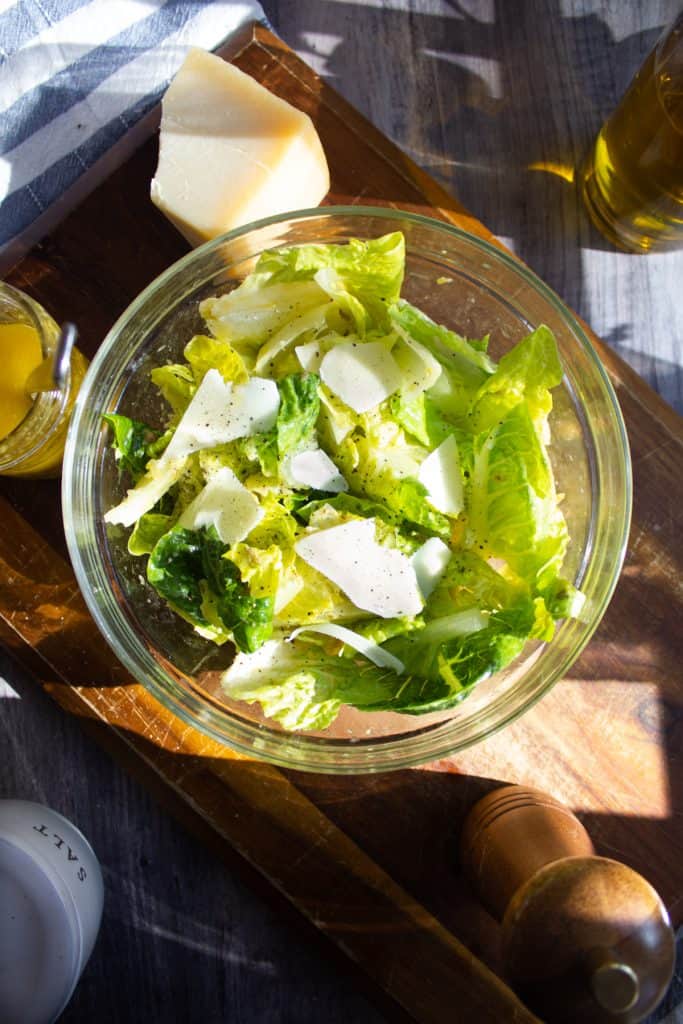 Romaine salad with traditional caesar dressing and parmesan
