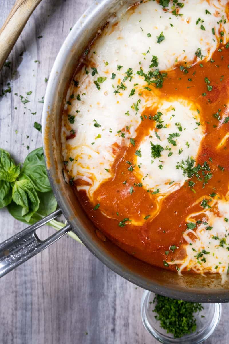 chicken pizzaiola with parsley and basil