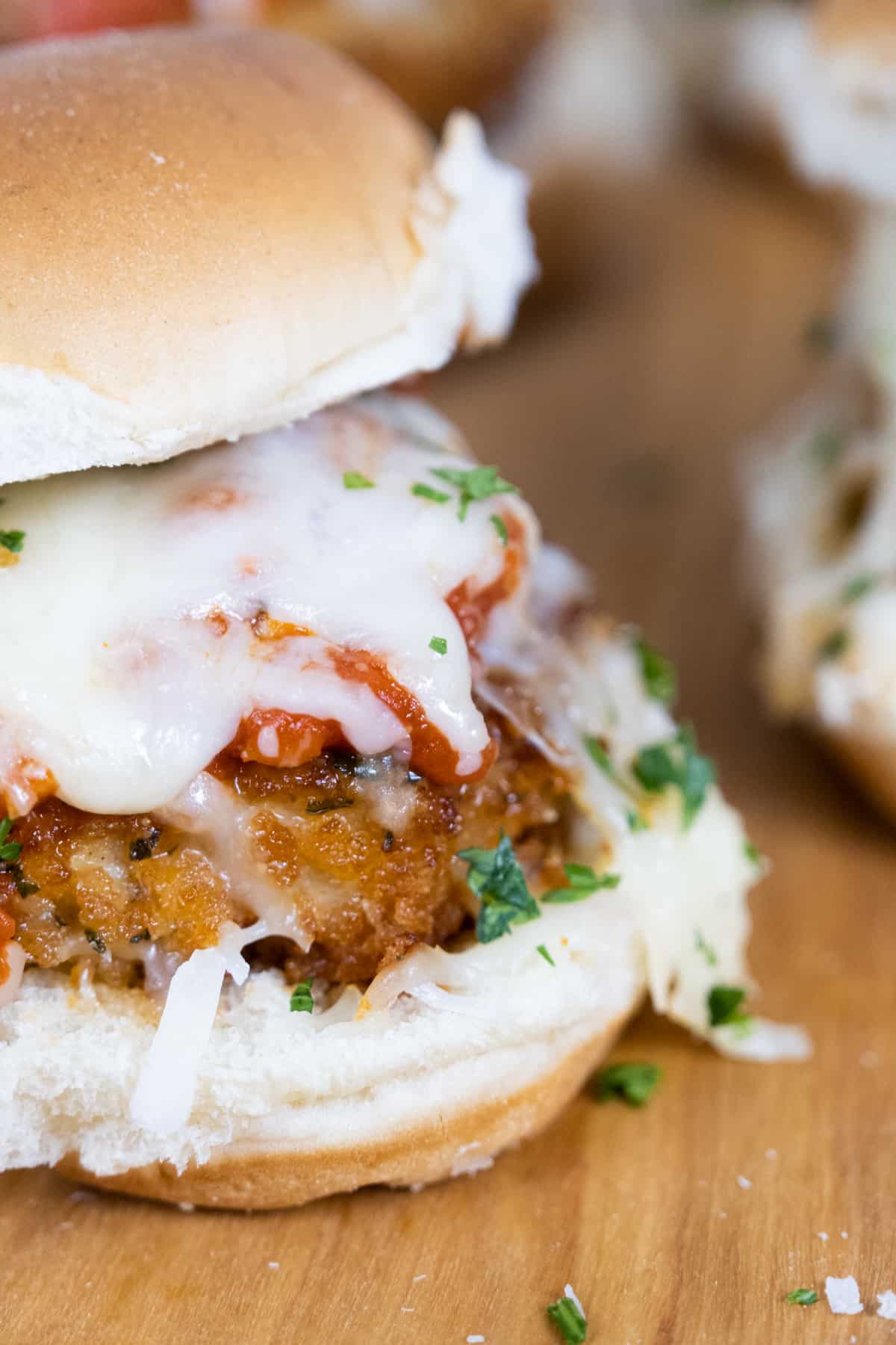chicken parm slider with tomato sauce and melted mozzarella
