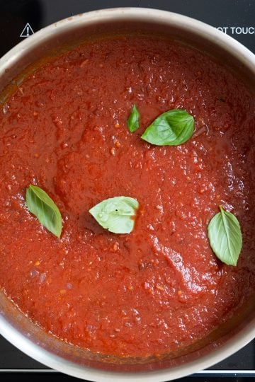 basil added to tomato sauce