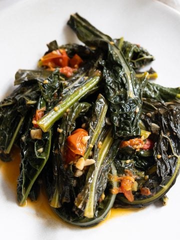 finished lacinato kale recipe braised with cherry tomatoes and garlic
