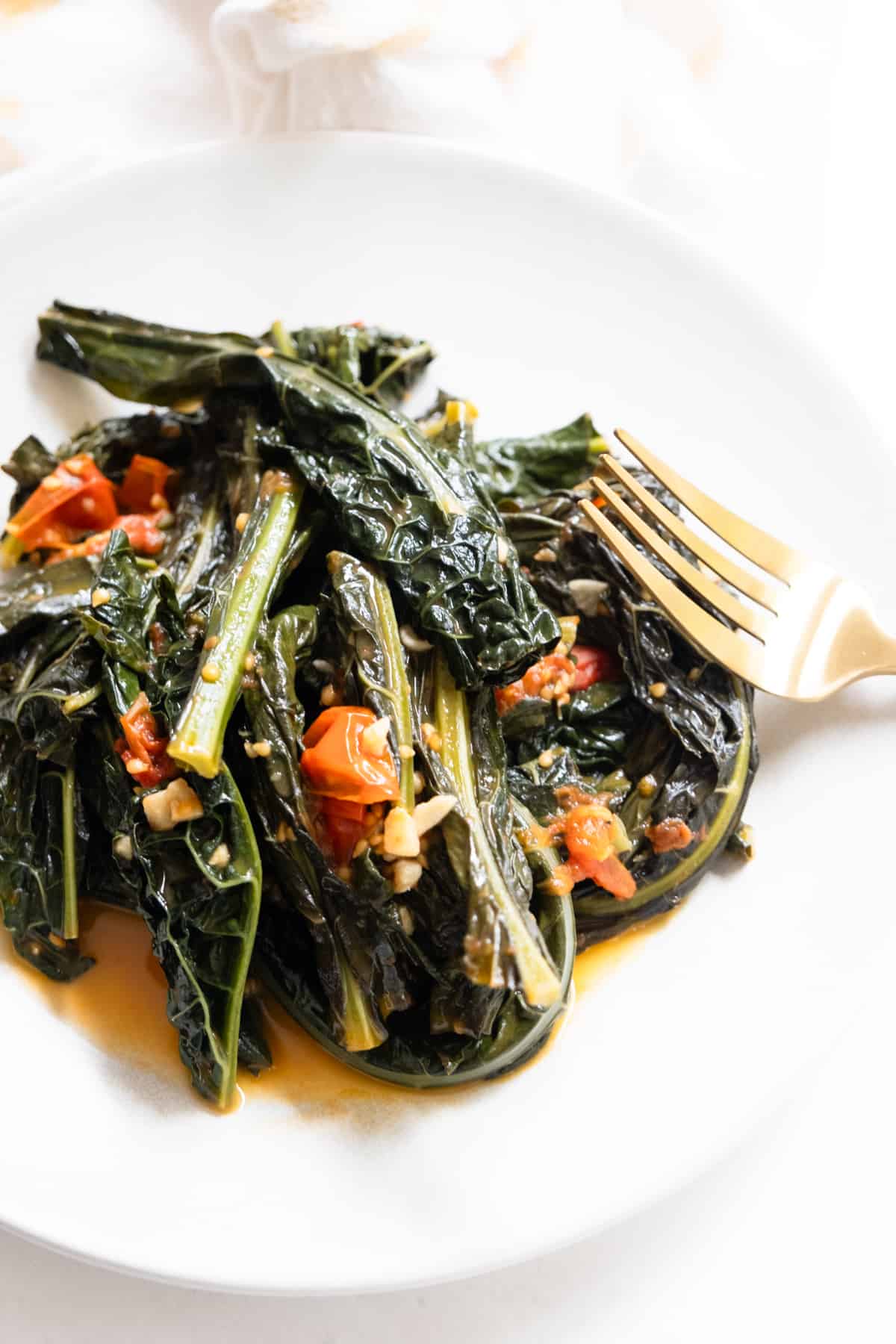 finished lacinato kale recipe braised with cherry tomatoes and garlic