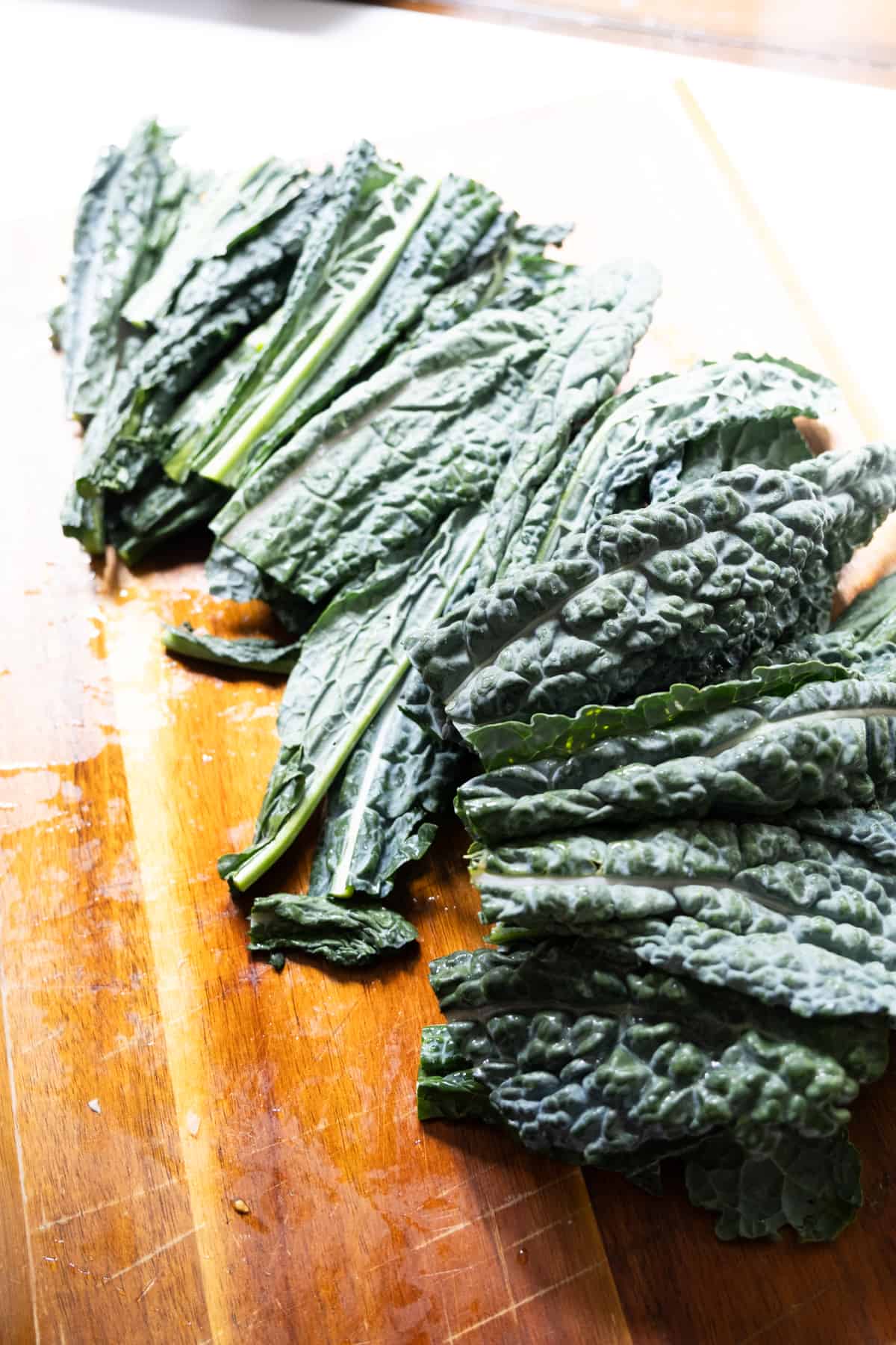 the lacinato kale shown prepared by cutting in half cross length