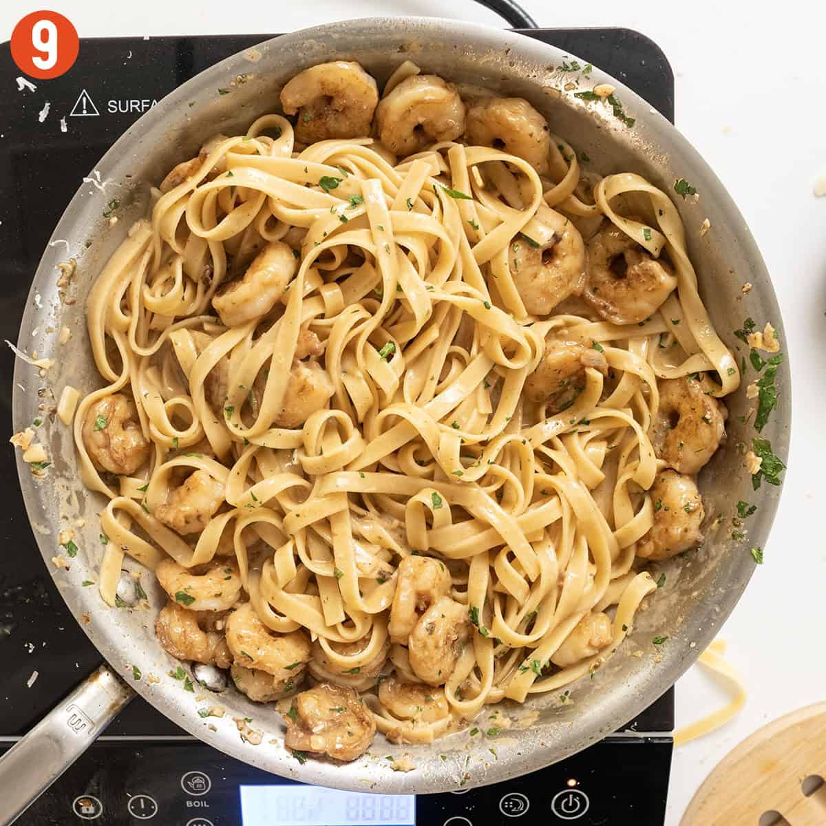 Cajun shrimp scampi in a pan.