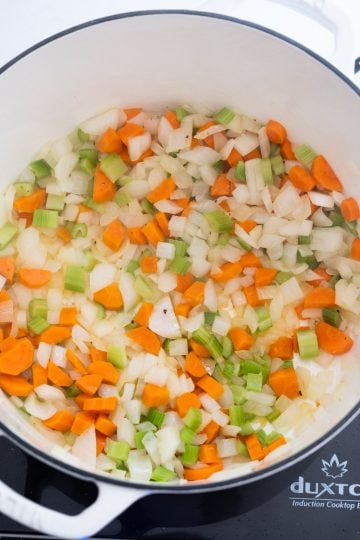 sauteing the carrots, celery, and onion