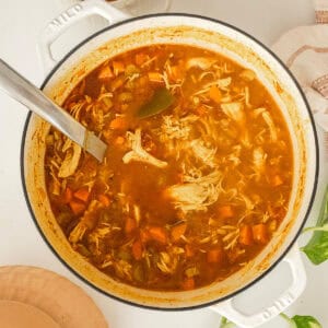 Chicken farro soup in a dutch oven.