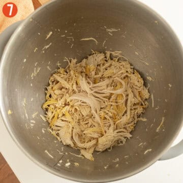Chicken breast removed from the soup and shredded.