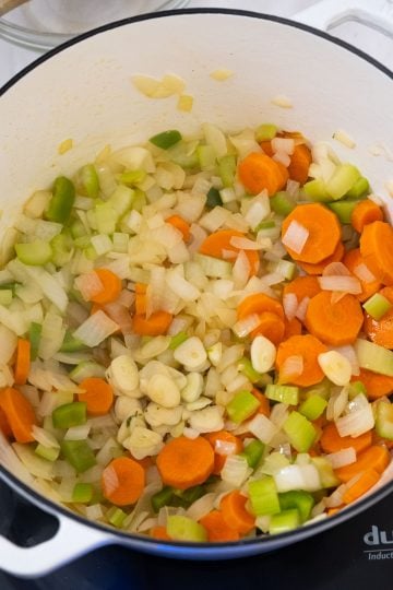 sauteing, onions, carrots, celery, and garlic