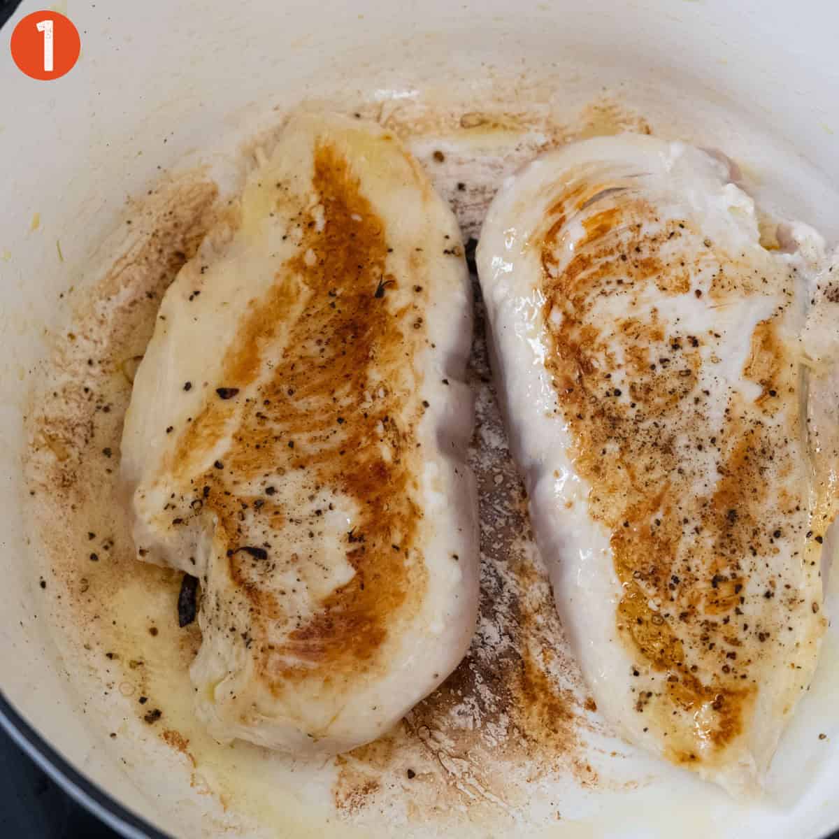 Searing chicken in the dutch oven.