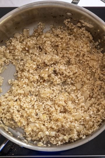 toasting rice until slightly yellow and you can see little white pills within the rice grains