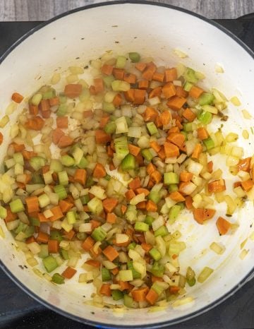 sauteing carrots, onions and celery with garlic