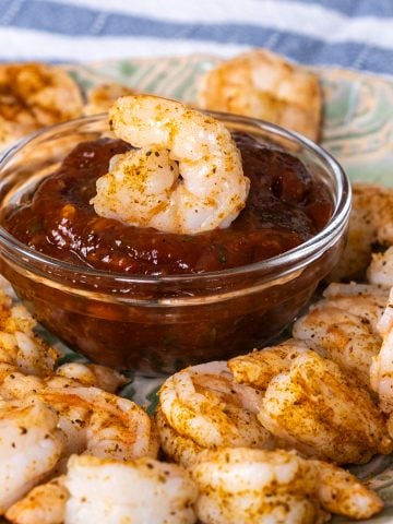 Shrimp Cocktail dipped in cocktail sauce