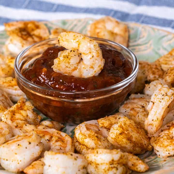 Shrimp Cocktail dipped in cocktail sauce