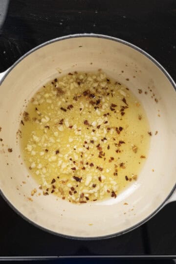crushed red pepper added to oil
