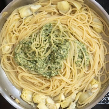 Pesto added to pasta