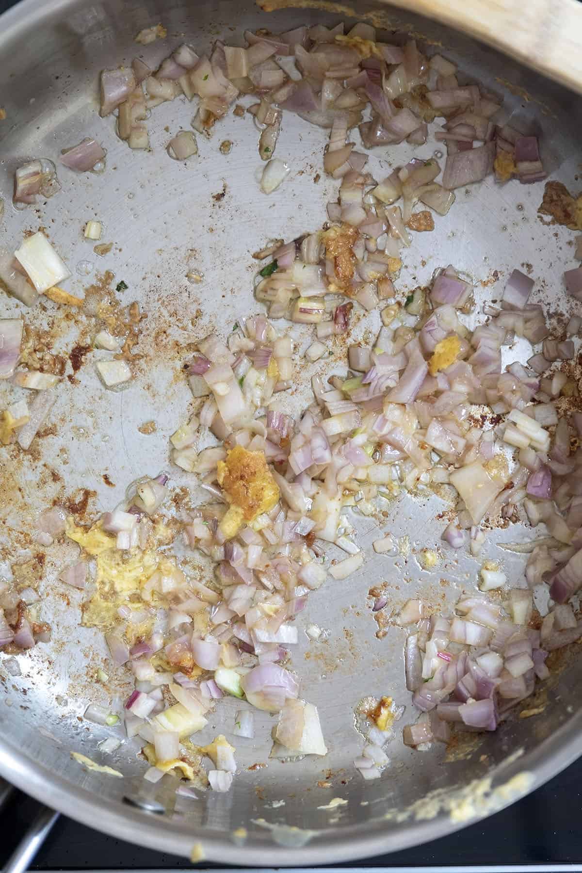 Gourmet Chicken Francese 9 Sautéing shallots and garlic in the pan after frying chicken