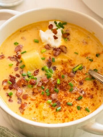 Creamy potato and onion soup topped with pancetta, chives, and sour cream.