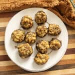 Italian sausage stuffed mushrooms on a plate.