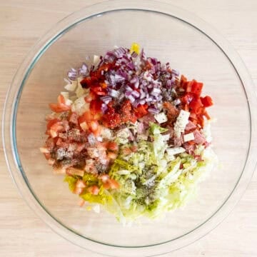 Combined vegetables and meat for the salad.