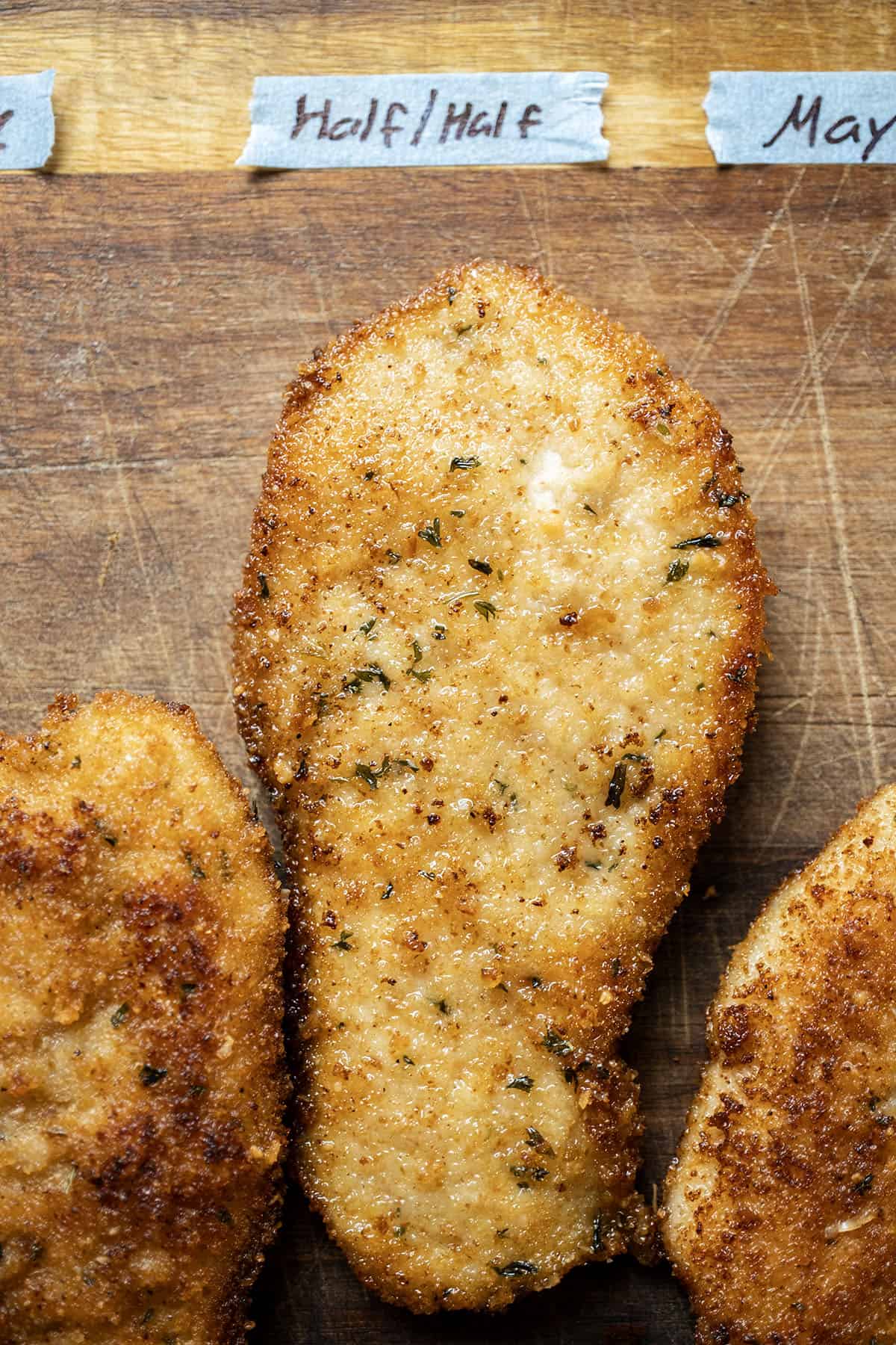 Chicken cutlet battered in half and half.