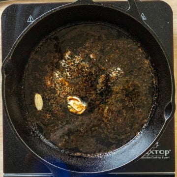 Simmering white wine butter sauce.