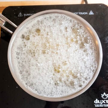 Boiling orzo.