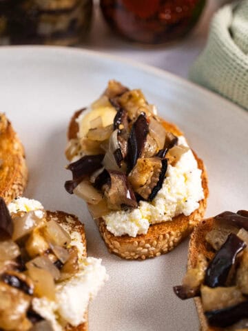 Marinated eggplant on toast with ricotta.