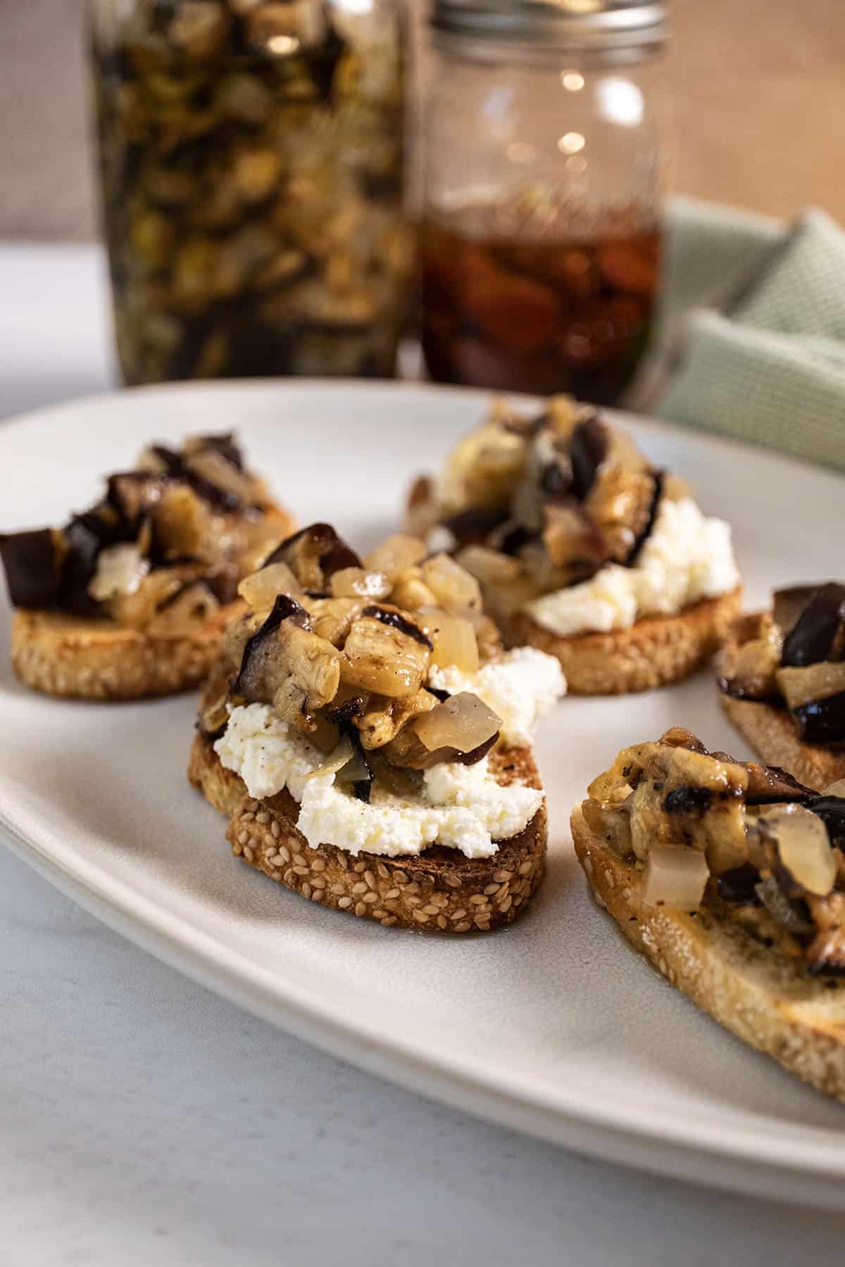 Marinated eggplant on toast with ricotta.