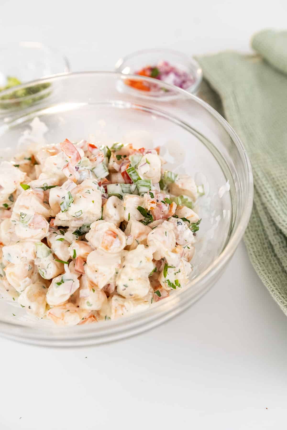 A bowl of cold shrimp salad.