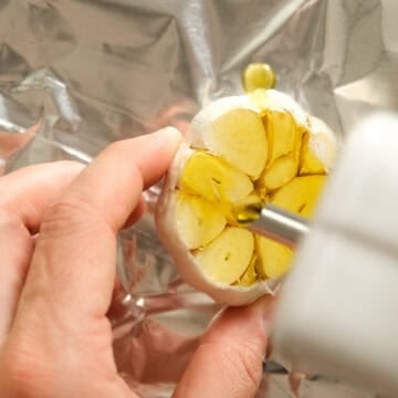 Roasted garlic in aluminum foil.