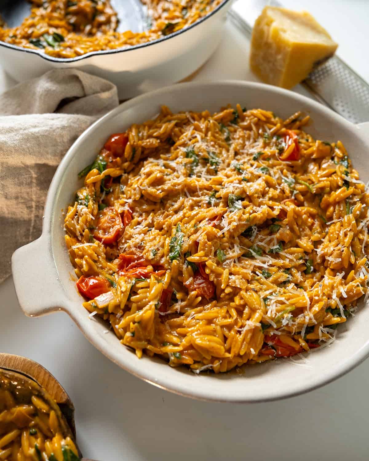 Creamy tomato orzo in a bowl.