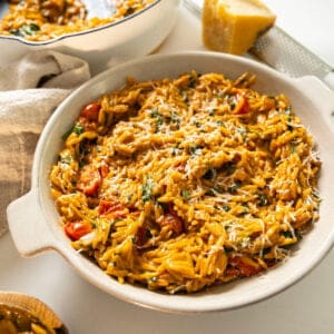 Creamy tomato orzo in a bowl.