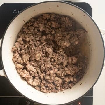 Browned meat in a pot.