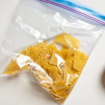 Lasagna in a ziploc broken up.