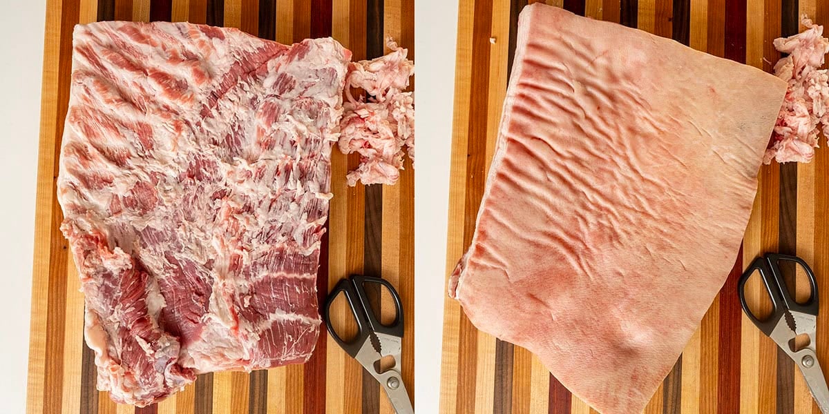 Skin on pork belly on a cutting board.