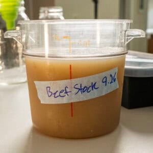 Beef stock in a container.