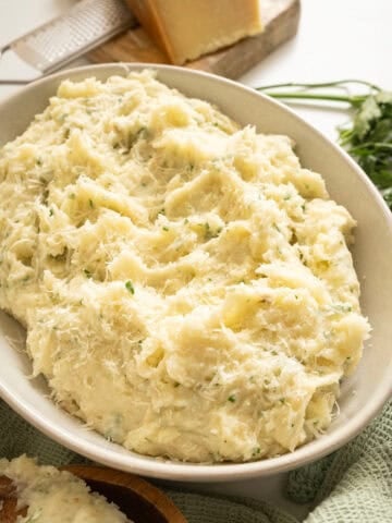 Garlic parmesan mashed potatoes in a bowl.