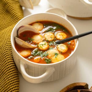 Manhattan clam chowder topped with oyster crackers.