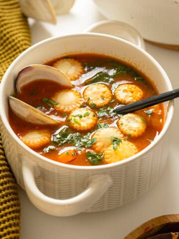 Manhattan clam chowder topped with oyster crackers.