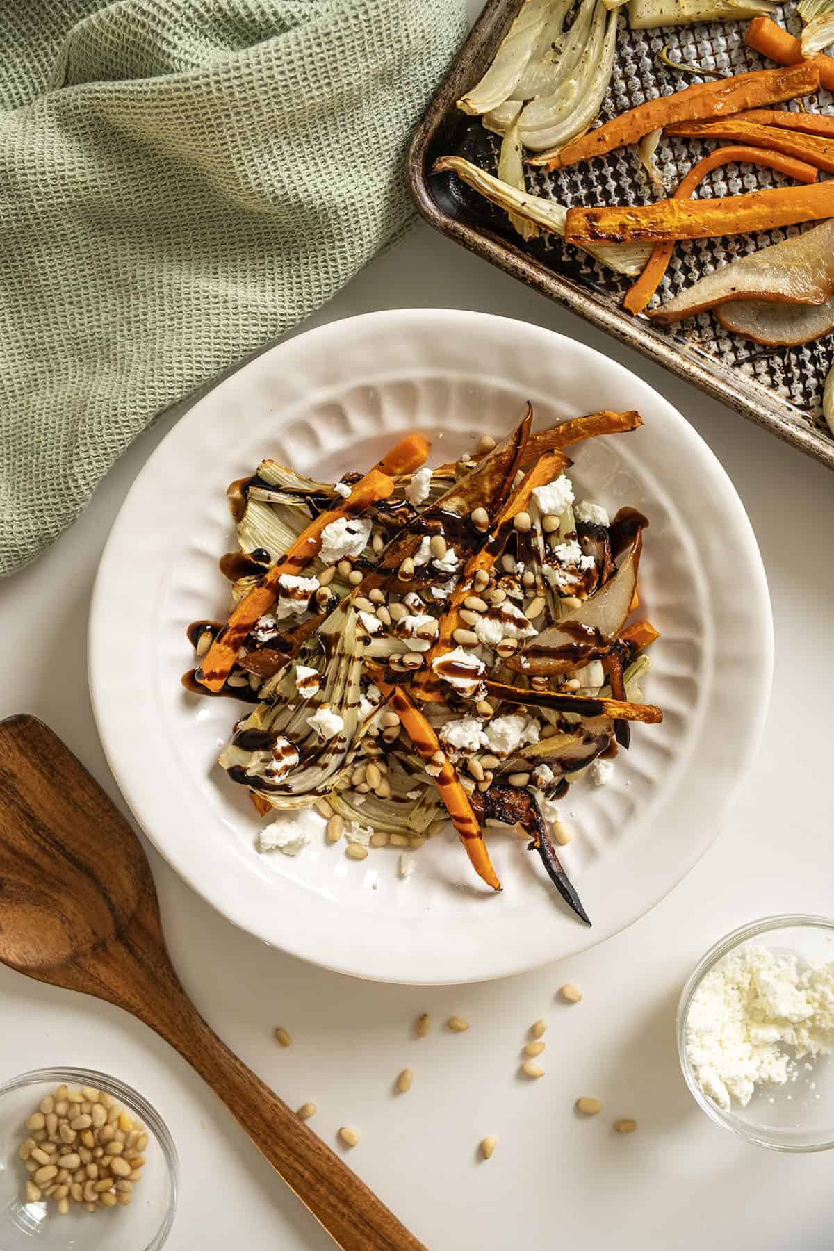 Roasted Carrots and fennel topped with pine nuts and balsamic glaze.