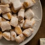 Homemade pumpkin gnocchi on a plate.